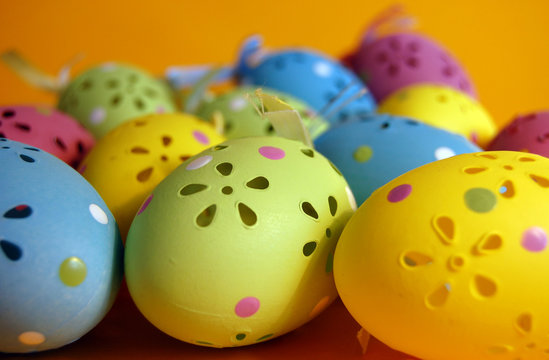 Colorful Easter Eggs on Orange Background