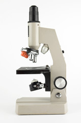 Microscope on white background