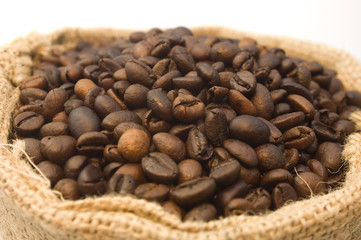 Burlap bag of coffee beans detail