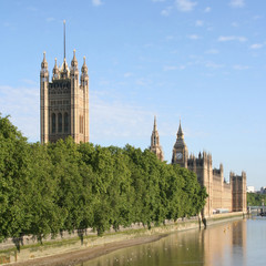 Fototapeta na wymiar Houses of Parliament reflected in River Thames, London