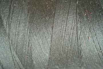 Fototapeta premium grey thread fabric wool yarn wrapped in a spool