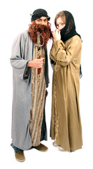 Arabic Arab veiled woman with Bedouin husband and sword