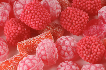 a close-up of various pink and red candy