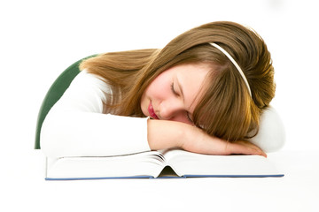 Girl Sleeping with Her Head on an Open Book