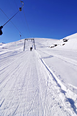 Fototapeta premium skilift in winter ski resort blue sky