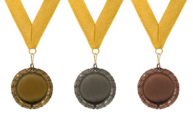 threee medals isolated over white. gold silver bronze