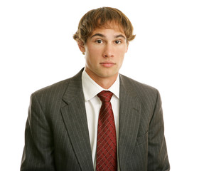 Young businessman with blank expression. 