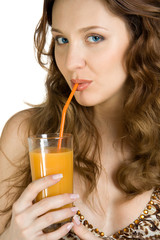 Attractive brunette drink orange juice. Isolate on white.