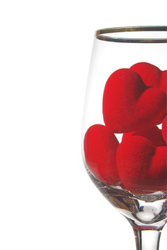 Hearts in a wine glass. Concept of love.
