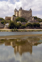 Fototapeta na wymiar The chateau at saumur on the banks of the river loire.