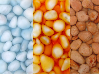 Multicolored pebbles covered with plastic resin