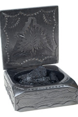 Decorative graphite chests with pieces coal inside.