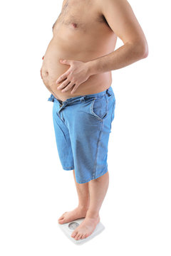 Fat Man Standing On A Weight Scale Isolated On White