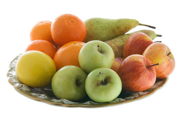 Plate full of fruits isolated on white