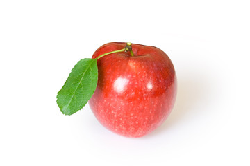 red apple with green leaf