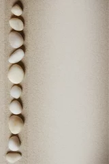 Deurstickers Zandige achtergrond met stenen © Olga Lyubkin