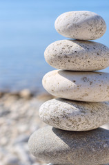 Fototapeta na wymiar Round stones for meditation laying on seacoast
