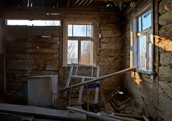 Fototapeta na wymiar View on mess inside of old house..
