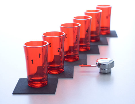 Six red glass glasses with the index on number 2