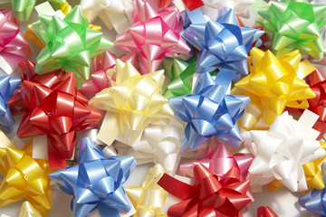 Plenty of colorful bows on a white background