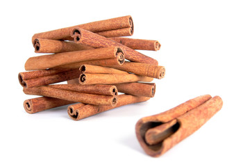 Cinnamon sticks house on white
