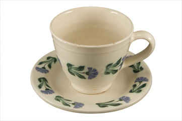 Empty tea cup with saucer isolated on white.