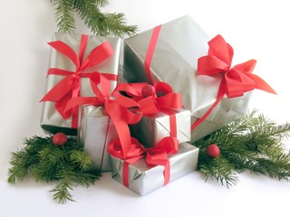 Christmas gifts in silvery paper