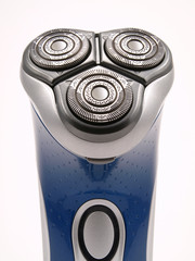 Three head electric razor close up
