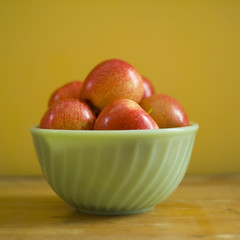 studio shot of a bowl of apples