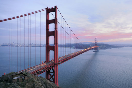 Golden Gate Brige with sunset colors in the background