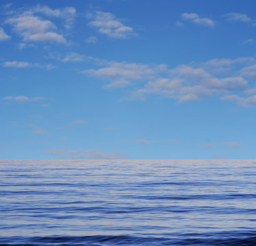 a picture of ocean water and clouds
