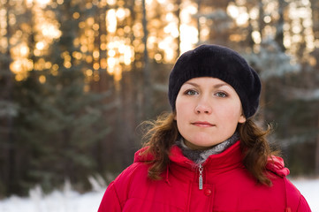 Girl in winter forest