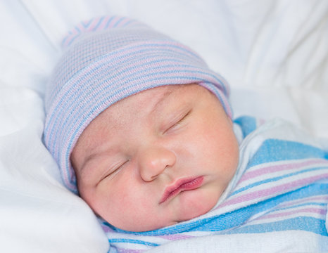 Newborn Baby Boy Sleeping In Hospital