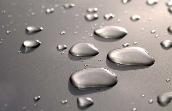 Surface Tension Of Raindrops On Metallic Panel