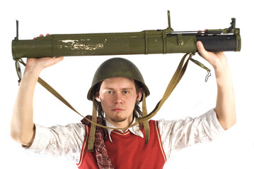 Man with rocketlauncher. Focus point on the face.