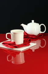 A modern home decor shot of a table set for tea