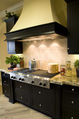 Luxury kitchen with modern stove close-up.