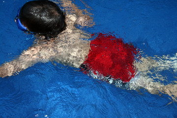 Boy Learning to Swim