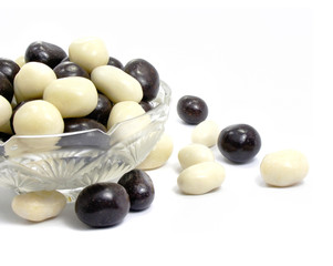group of black and white sweet candies isolated over white