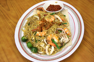 Chinese fried seafood noodles with prawns and squid