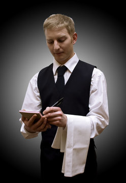 Waiter with notepad