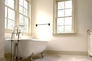 minimalist bathroom with clawfoot tub