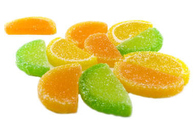Fototapeta na wymiar colourful fruit candies isolated over white