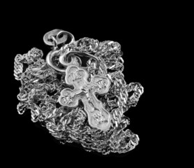 Obraz premium Silver chain with a dagger. The crucifixion