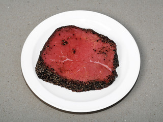 Peppersteak on white plate
