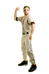 Naklejka premium A young male baseball player throwing.