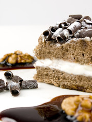 Cake of chocolate, cream and nuts.