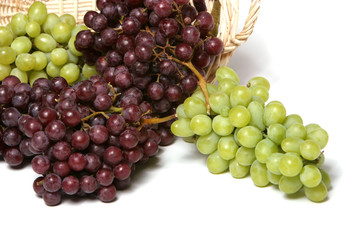Red and green grapes in basket