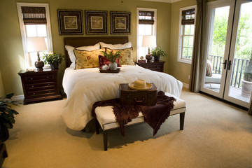 Luxury home bedroom with stylish furniture and decor.