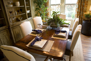 Dining room and table with luxurious decor.